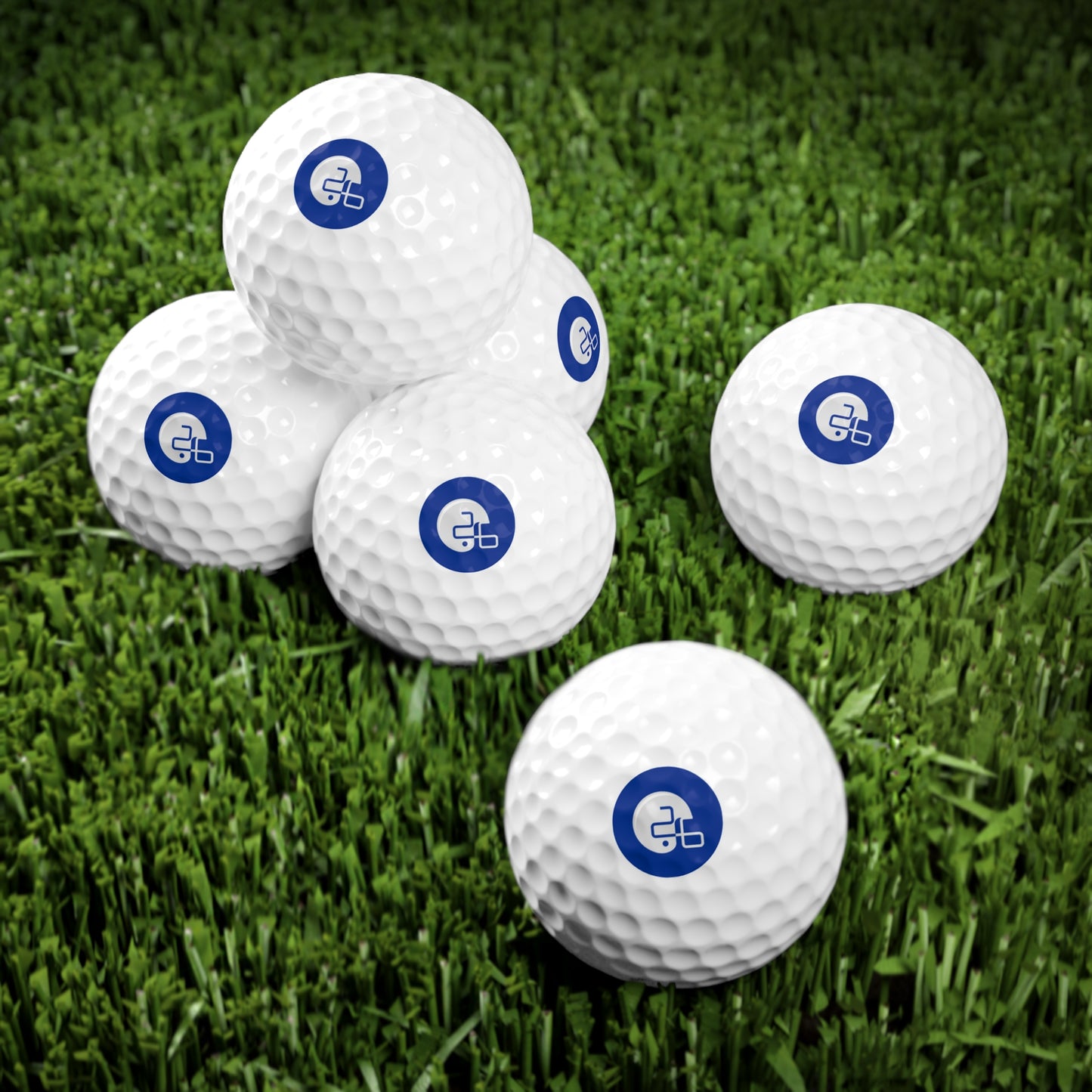Six Pup26 Dallas Cowboys Golf Balls with blue logos on them by Printify.