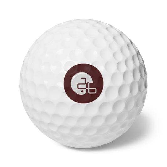 A Pup26 Aggie golf ball with a maroon Printify logo on it.
