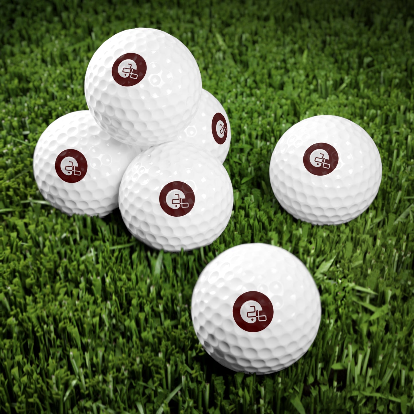 Ten Printify Pup26 Aggie Golf Balls, 6pcs with a logo on them.
